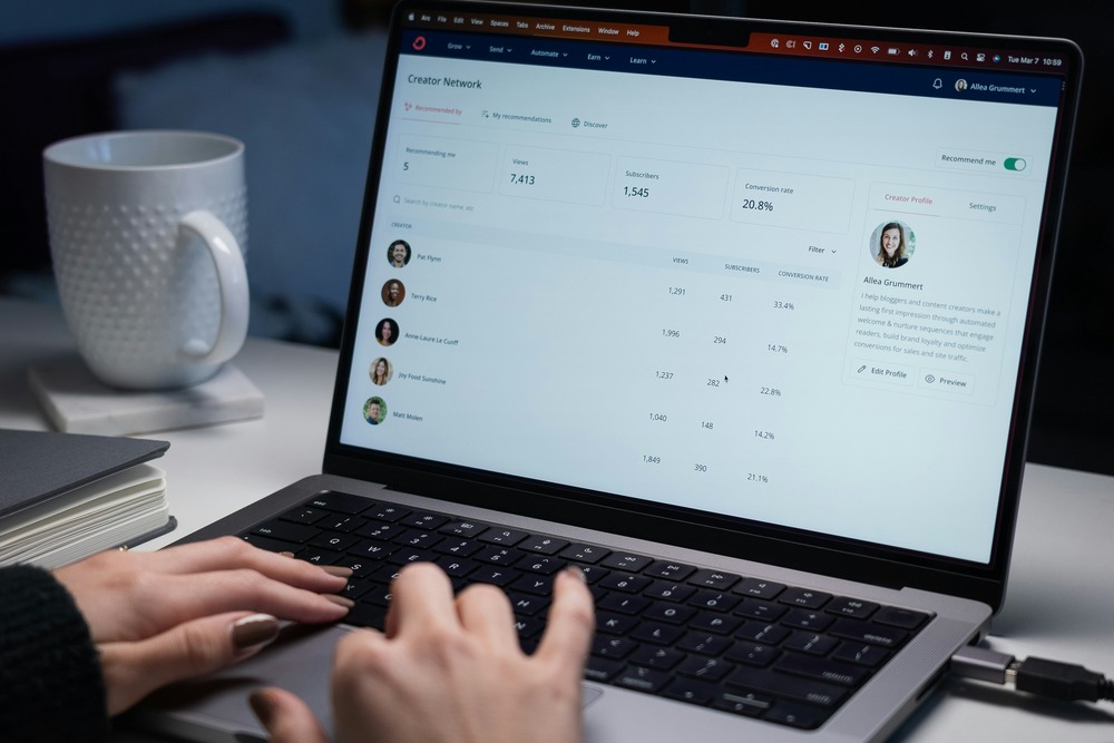 a man monitoring email marketing campaign on his laptop